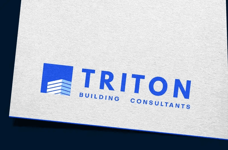 Blue logo for Triton Building Consultants featuring a building icon on textured white paper.