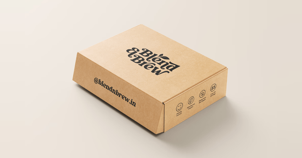 Brown cardboard box featuring the "Blend & Brew" logo and website URL on white.