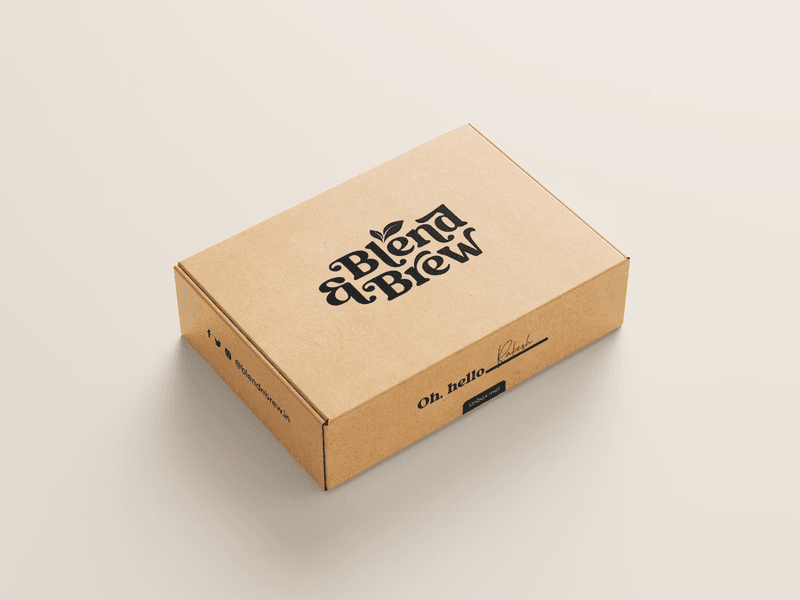 A brown cardboard shipping box featuring the black "Blend & Brew" logo on top.